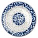 A close up of a blue and white Thunder Group melamine plate with a circular dragon design.