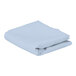 A folded light blue rectangular cloth table cover.