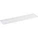 A white metal shelf with a metal wire rack.
