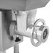 A ProCut stainless steel electric meat grinder with a black rubber handle.