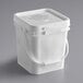 A white Cookie Dough Bliss tub with a handle.