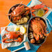 A bowl of Chesapeake Blue Crab and corn on a table with a crab and corn in a bowl.