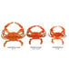 A row of seasoned steamed blue crabs in different sizes with a measuring tape.