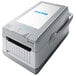 A grey Sato WWFX31241 FX3-LX label printer with a blue logo on the screen.