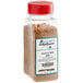 A plastic container of Regal Original Sweet and Salty Jerky Seasoning with a white label and red lid.