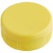 A yellow plastic cap with a heat induction seal liner.