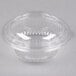 A Dart clear plastic bowl with a clear dome lid.