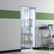 A Lavex Polar reinforced strip door on a glass door with a shelf of boxes.