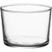 A clear glass container with a curved edge.