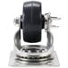 A metal plate caster with a black rubber wheel.