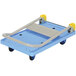 A blue cart with a gray handle.