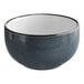 A close up of an Acopa Embers Midnight Blue Matte stoneware bowl with a white rim.