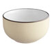 A white stoneware bowl with a black rim.