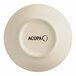 A white stoneware bowl with the word Acopa in black text.