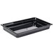 A black Cambro H-Pan plastic food pan on a counter.