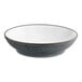 A close-up of an Acopa Midnight Blue Matte Pasta Bowl with a white rim.