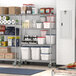 Steelton chrome wire shelving kit in a school kitchen with food items on shelves.