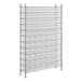 A wireframe metal shelving unit with many clear plastic bins on each shelf.