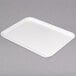 A white Carlisle fiberglass market tray.