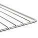 A Town metal rack with a grid and handle.