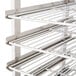 A Town rack for Town smokehouses with metal bars and a shelf.