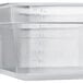 a plastic container with measuring cups