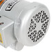 The silver motor of a Hobart commercial garbage disposer.