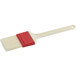 A Thermohauser pastry brush with a white plastic handle and natural bristles.