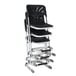 A stack of black National Public Seating Elephant Z-Stools with backrests.