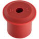 A red plastic Narvon spigot gasket with a hole in it.