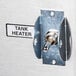 A Bunn pour over coffee brewer switch with a label and metal plate.