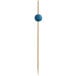 A wooden stick with a blue ball on top.