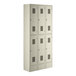 A group of beige Regency metal lockers with six doors.