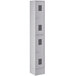 A gray Regency metal locker with three doors.