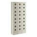 A beige Regency metal locker with 12 doors.