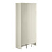A beige metal Regency locker with three wide doors and six tiers.