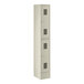 A beige Regency locker with three doors and two tiers.