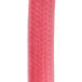 A close-up of a red rubber tube.