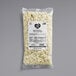 A bag of Follow Your Heart Dairy-Free Vegan Crumbled Bleu Cheese with a label.