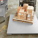 A pallet on a Tor Rey industrial floor scale with boxes on it.