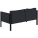 A black Flash Furniture loveseat with metal legs.