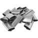 A pile of Lavex serrated metal pieces.