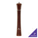 A brown pepper mill with a wooden handle and silver lid.