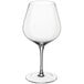 A close-up of a clear Della Luce Maia Burgundy Wine Glass with a stem.