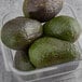 A clear plastic container of Fresh Hass Avocados.