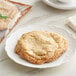 A Sweet Street Desserts salted caramel cookie on a plate.