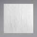 A white square paper with a gray background.