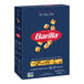 A blue box of Barilla Ditalini Pasta with a blue label and a red circle with white text.