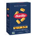 A blue Barilla box of Mezzi Rigatoni pasta.