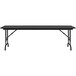 A black rectangular Correll folding table with adjustable legs.